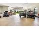 Spacious garage with several vehicles and equipment, with convenient access to the outdoors at 21210 77Th E Ave, Bradenton, FL 34202
