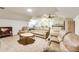 This bonus room has comfortable leather seating with a full kitchenette and eating area at 21210 77Th E Ave, Bradenton, FL 34202