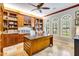 Spacious office with custom built-ins, detailed trim, and abundant natural light at 21210 77Th E Ave, Bradenton, FL 34202