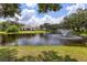 The pond has a fountain in the middle of it, and other water features scattered around at 21210 77Th E Ave, Bradenton, FL 34202