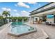 Stunning outdoor oasis with pool, spa, and outdoor kitchen perfect for entertaining at 21210 77Th E Ave, Bradenton, FL 34202