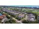 Gorgeous aerial view showcases the Harbour Oaks neighborhood, including houses, roads, and the beautiful golf course at 2155 Harbourside Dr # 804, Longboat Key, FL 34228