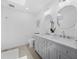 Bright bathroom featuring double vanity with sleek fixtures and ample storage at 2155 Harbourside Dr # 804, Longboat Key, FL 34228