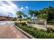 Stone Harbour Oaks sign surrounded by lush landscaping on a sunny day, welcoming residents and visitors alike at 2155 Harbourside Dr # 804, Longboat Key, FL 34228