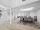 Bright dining room features light wood floors and open concept design at 2155 Harbourside Dr # 804, Longboat Key, FL 34228