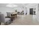 Open concept living area with modern furnishings and light wood floors at 2155 Harbourside Dr # 804, Longboat Key, FL 34228