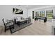 Cozy living room with black and white decor and hardwood floors at 2155 Harbourside Dr # 804, Longboat Key, FL 34228