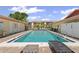 Inviting community pool area with lounge chairs and clear blue water, surrounded by well-maintained buildings at 2415 Bayshore Gardens Pkwy # 2, Bradenton, FL 34207