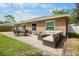 Spacious patio featuring outdoor furniture, perfect for entertaining or enjoying the backyard at 2761 Feiffer Cir, Sarasota, FL 34235
