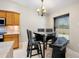 Cozy dining area with a modern light fixture, and a window at 2761 Feiffer Cir, Sarasota, FL 34235