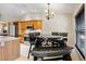 Eat-in kitchen boasts modern stainless appliances and dining table at 2761 Feiffer Cir, Sarasota, FL 34235