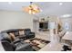 Comfortable living room features modern ceiling fan and mounted TV console at 2761 Feiffer Cir, Sarasota, FL 34235
