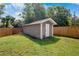 Exterior view of the shed in the backyard with plenty of additional storage space at 2761 Feiffer Cir, Sarasota, FL 34235