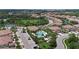 Aerial view of community with beautiful landscaping, pool area, and various residential buildings at 2920 Oriole Dr, Sarasota, FL 34243