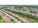 Aerial view of the community showcases the neighborhood's layout, proximity to ponds, and beautifully maintained streets at 2920 Oriole Dr, Sarasota, FL 34243