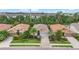 Aerial view of the home showcases its well-manicured landscaping and charming curb appeal at 2920 Oriole Dr, Sarasota, FL 34243