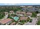 Aerial view of community featuring pool, lush landscaping and residential buildings at 2920 Oriole Dr, Sarasota, FL 34243