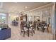 Clubhouse dining area and bar featuring barstool seating and dining tables at 2920 Oriole Dr, Sarasota, FL 34243