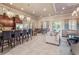 Spacious community clubhouse with kitchen, dining and seating areas for residents to gather at 2920 Oriole Dr, Sarasota, FL 34243