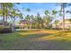 Dog park with covered area, picnic table, and plenty of space for dogs to play and relax at 2920 Oriole Dr, Sarasota, FL 34243