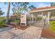 Fenced dog park with seating and shade structure, perfect for pet owners at 2920 Oriole Dr, Sarasota, FL 34243