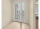 Bright foyer with tile floors and a decorative glass front door providing an inviting entrance at 2920 Oriole Dr, Sarasota, FL 34243