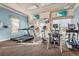 Bright fitness center with treadmills, bikes, and exercise machines for resident's use at 2920 Oriole Dr, Sarasota, FL 34243