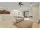 Spacious living room with neutral tones, tile floors, and access to the outdoor patio at 2920 Oriole Dr, Sarasota, FL 34243