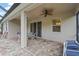 Covered patio featuring brick pavers and a ceiling fan at 2920 Oriole Dr, Sarasota, FL 34243