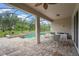 Relaxing screened-in pool area features a spa and outdoor seating, perfect for entertaining and enjoying the backyard oasis at 2920 Oriole Dr, Sarasota, FL 34243