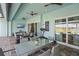 Relaxing outdoor space with dining area, lounge seating, and serene water views at 29527 Leah Rd, Punta Gorda, FL 33982