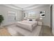 Stylishly furnished bedroom with tray ceiling and decorative rug at 3362 Howell Pl, Sarasota, FL 34232