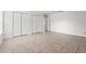 Neutral bedroom with tile flooring and double door closets at 3362 Howell Pl, Sarasota, FL 34232