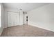 Bedroom with tile flooring, closet, and a view to other parts of the home at 3362 Howell Pl, Sarasota, FL 34232