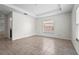 Spacious bedroom with tile floors and plenty of natural light at 3362 Howell Pl, Sarasota, FL 34232