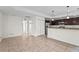 Bright, open concept kitchen features a kitchen island with barstool seating at 3362 Howell Pl, Sarasota, FL 34232