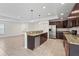 Modern kitchen featuring granite countertops and stainless steel appliances at 3362 Howell Pl, Sarasota, FL 34232