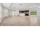 Large open living space with tile flooring connecting the kitchen to the living areas at 3362 Howell Pl, Sarasota, FL 34232
