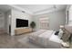 Tastefully decorated bedroom with tray ceiling and modern decor at 3362 Howell Pl, Sarasota, FL 34232