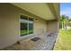 Covered patio with brick pavers, perfect for outdoor relaxation at 3362 Howell Pl, Sarasota, FL 34232