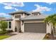 Charming single-Gathering home with a well-manicured lawn, tile roof, and a two-car garage at 3621 Wild Blossom Pl, Parrish, FL 34219