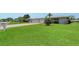 This house has a lush green lawn and a driveway leading to a two-car garage, complementing the home's curb appeal at 3641 Somerville Dr # 1506, Sarasota, FL 34232