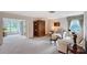Bright living room with soft carpeting, neutral tones, and abundant natural light creating a cozy atmosphere at 3641 Somerville Dr # 1506, Sarasota, FL 34232