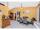 Bright dining area with tile floors, wood furniture, and stylish decor at 4145 W Price Blvd, North Port, FL 34286