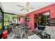 Screened patio with ceiling fan offers indoor/outdoor living at 4145 W Price Blvd, North Port, FL 34286