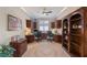 Functional home office with built-in cabinetry and desk space, featuring a neutral color scheme at 4200 Reflections Pkwy, Sarasota, FL 34233