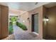 Comfortable townhome entryway with brick pavers, neutral-colored walls, and individual unit entry doors at 4235 Overture Cir # 4235, Bradenton, FL 34209