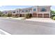 Inviting townhomes with garages, manicured landscaping, and paved streets create an appealing community atmosphere at 4235 Overture Cir # 4235, Bradenton, FL 34209
