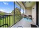 Enjoy the view from this screened patio with seating, perfect for relaxing outdoors at 4235 Overture Cir # 4235, Bradenton, FL 34209