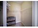 Uncluttered walk-in closet featuring shelving for optimal storage and organization at 4235 Overture Cir # 4235, Bradenton, FL 34209